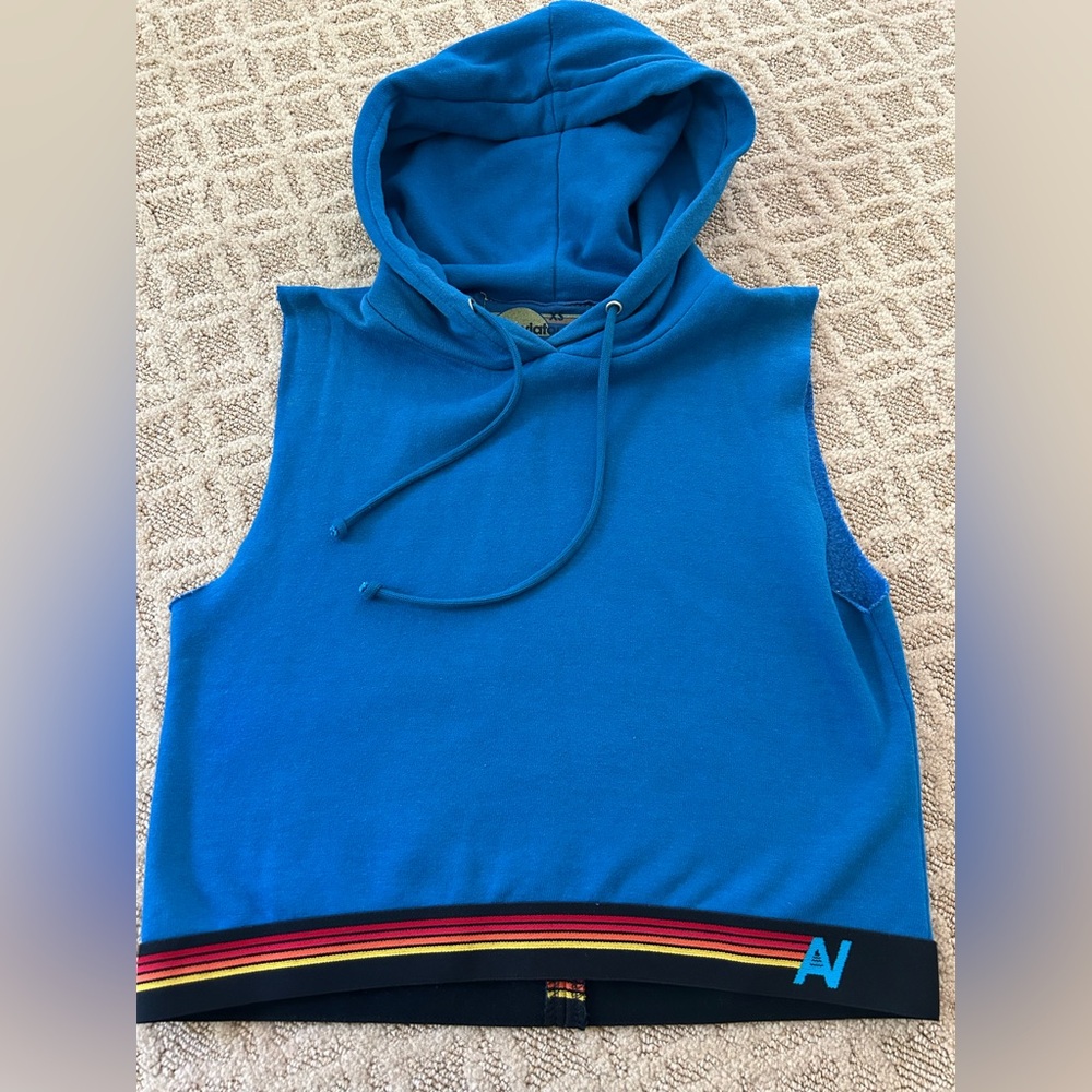 Women’s Aviator sleeveless hoodie top.